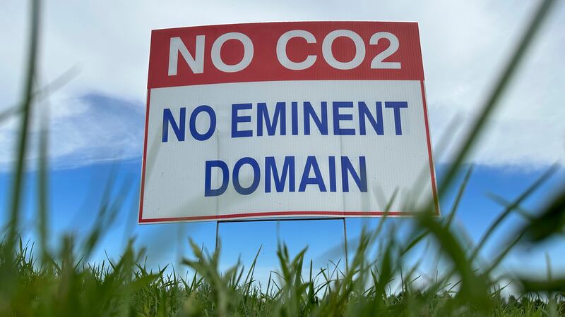 File - A sign reading "No CO2, no eminent domain"