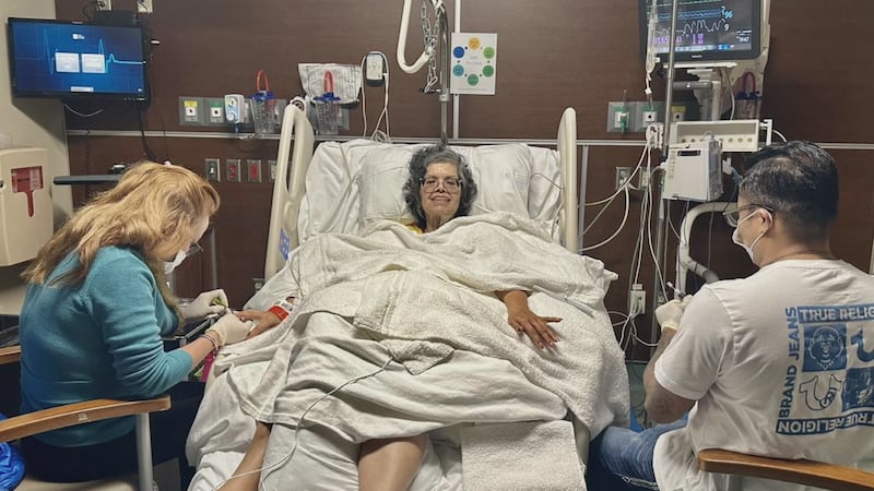 John Dawkins, the owner of Absolute Nails, and his wife visited the hospital to do a manicure...