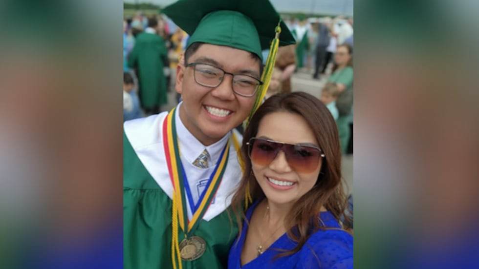 Ann Nguyen Tran takes a selfie with her son and Bishop Carroll High School valedictorian,... Ann Nguyen Tran takes a selfie with her son and Bishop Carroll High School valedictorian,...