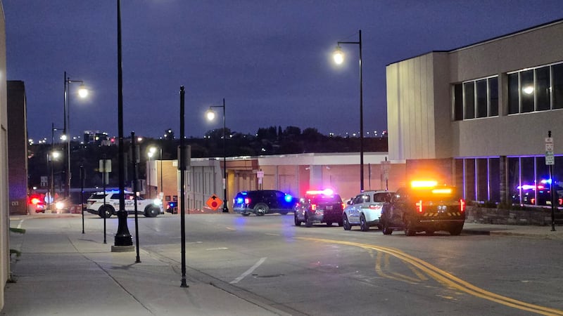 One person is in custody following a large law enforcement presence in downtown Minot Tuesday...