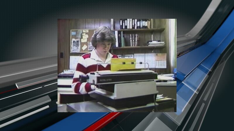 Monica Hannan at a typewriter